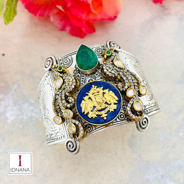DUAL TONE BLUE ENAMELLED EMERALD DOUBLET MOISSANITE CZ  PEACOCK MOTIF STATEMENT HANDCUFF