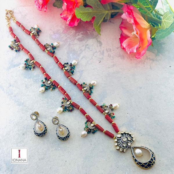 GOLD PLATED BLUE MEENAKARI MOISSANITE  PEARL NECKLACE BEADED WITH CORALS AND MOISSANITE BLUE MEENAKARI EARRINGS