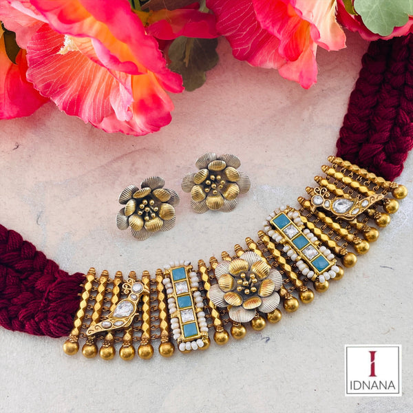 DUAL TONE FLORAL MOTIF TURQUOISE WHITE KUNDAN SLAB KUNDAN PEACOCK MOTIF MAROON THREADED CHOKER SET